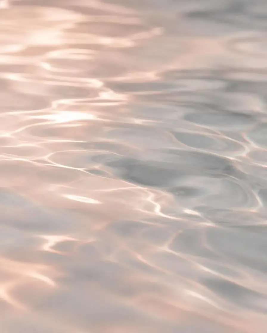 Gentle water ripples in soft light